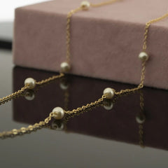 The Golden Pearl Station Necklace