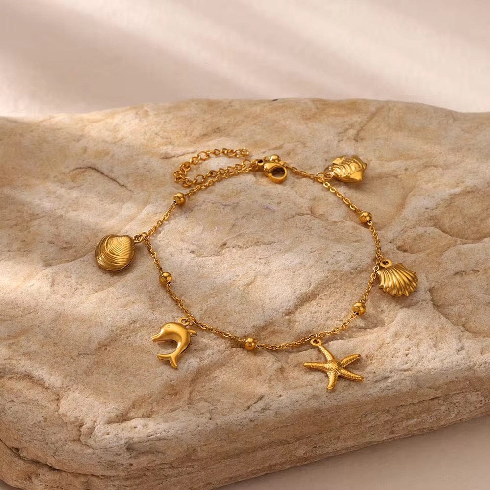 The Golden Seashell Charm Bracelet