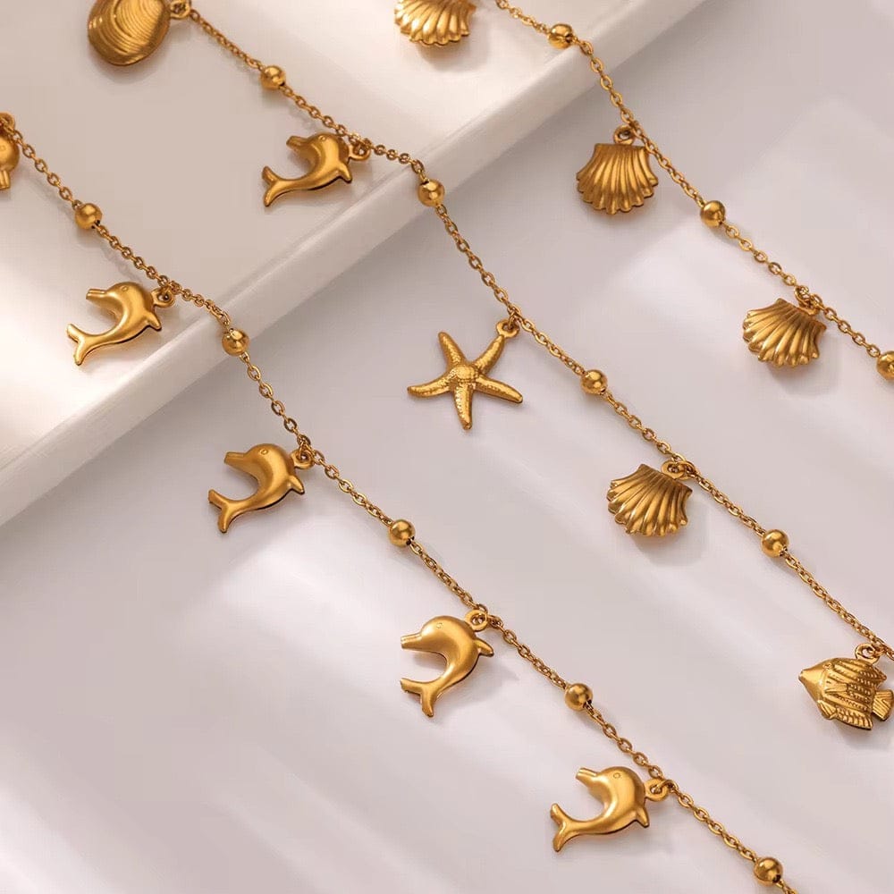 The Golden Seashell Charm Bracelet
