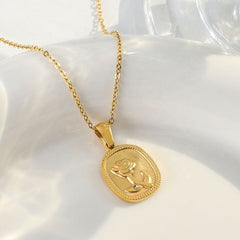 Rose Coin Pendant Necklace – Dainty Embossed Floral Medallion with Sparkling Zircon Accent for Women