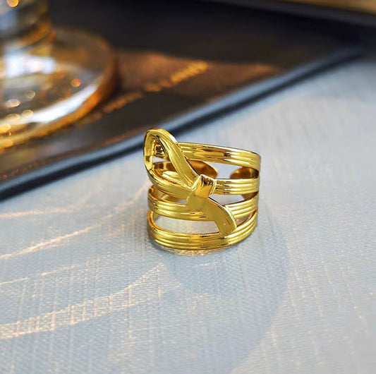 The Fluid Wave Coil Ring