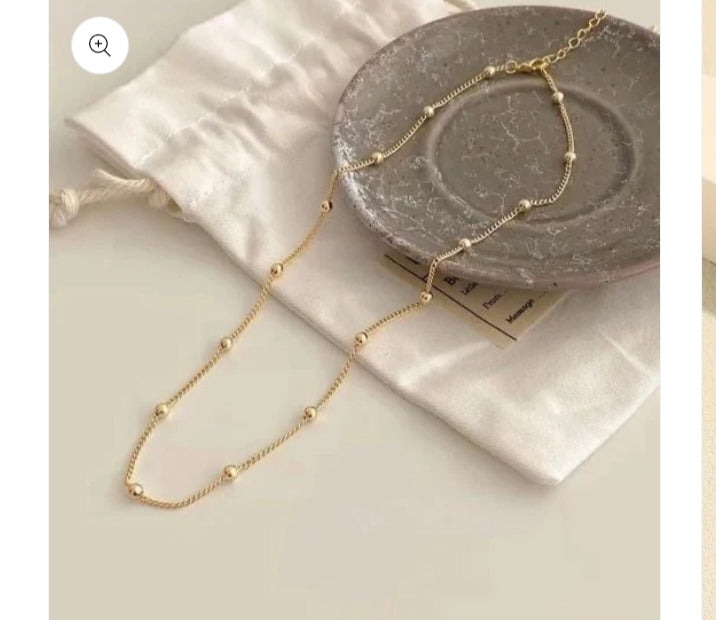 The Gold "Glow" Satellite Snake Chain